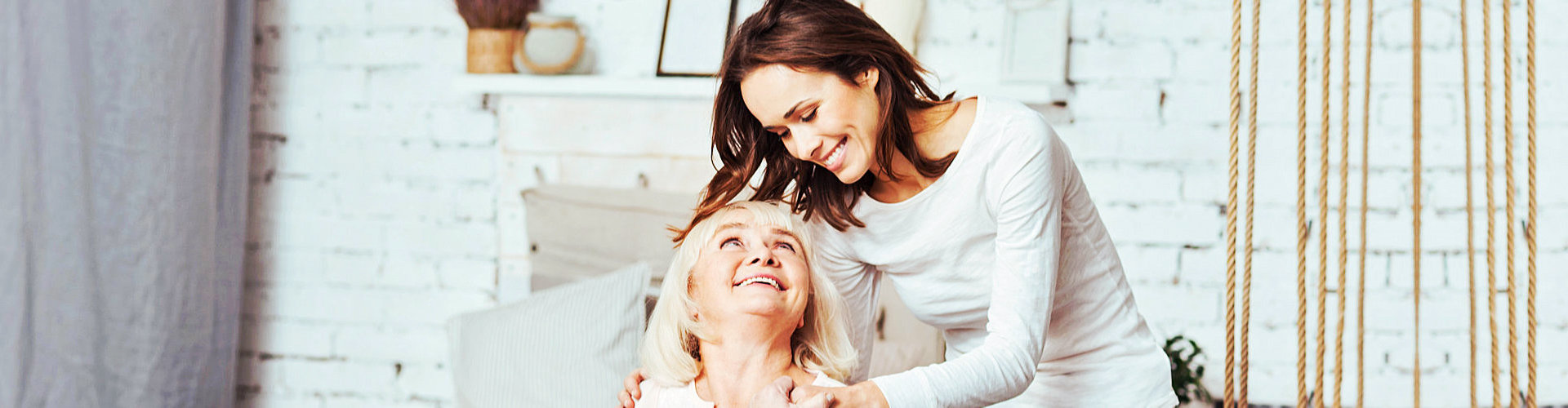 happy senior woman with her daughter